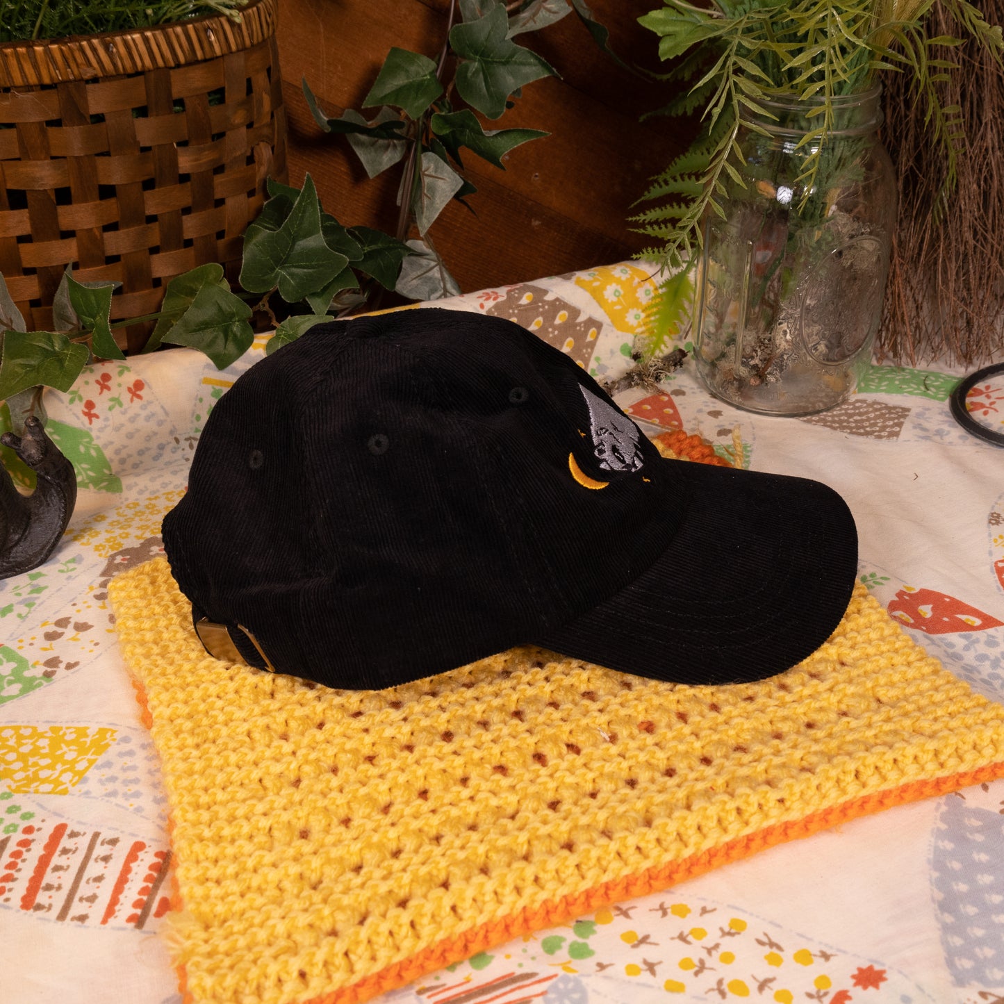 Sleepy Raccoon Black Embroidered Corduroy Cap